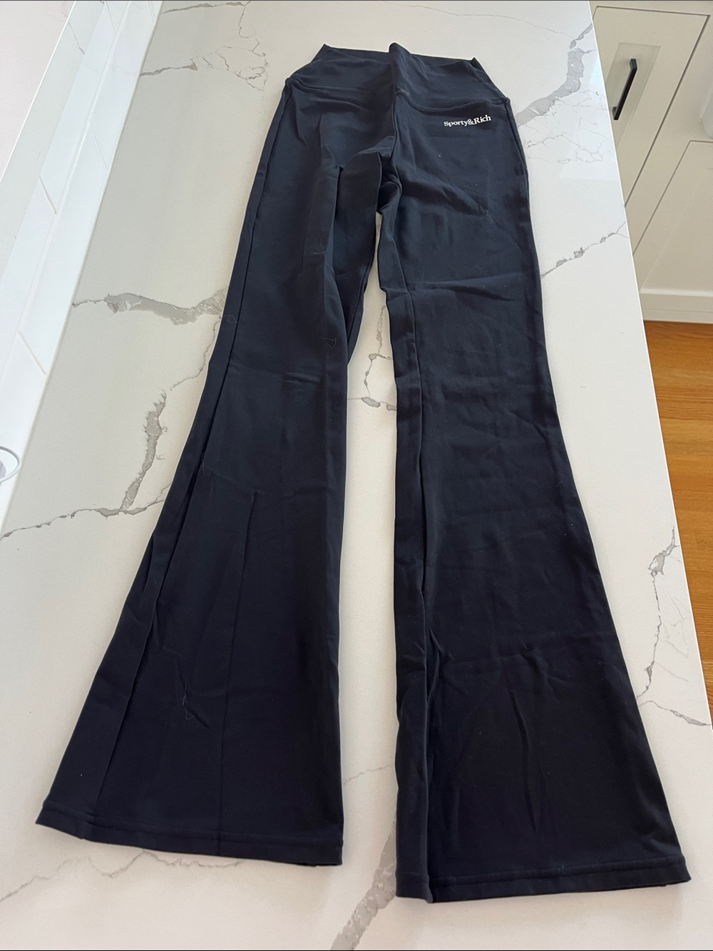 Sporty & Rich Black High-Rise Flare Leggings